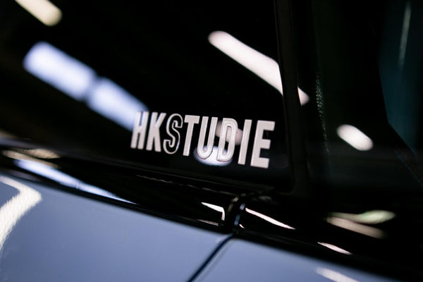 HKS HKSTUDIE Sticker - White - Premium Stickers/Decals/Banners from HKS - Just 56.34 SR! Shop now at Motors