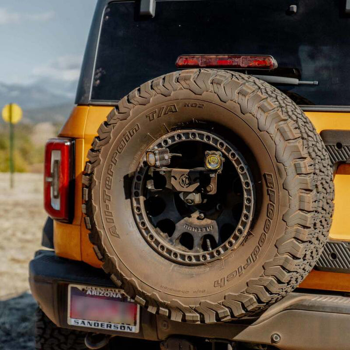 KC HiLiTES 21-24 Ford Bronco Spare Tire Carrier Light Mount w/ M12x1.5 Lug Nuts - Premium Light Mounts from KC HiLiTES - Just 337.99 SR! Shop now at Motors