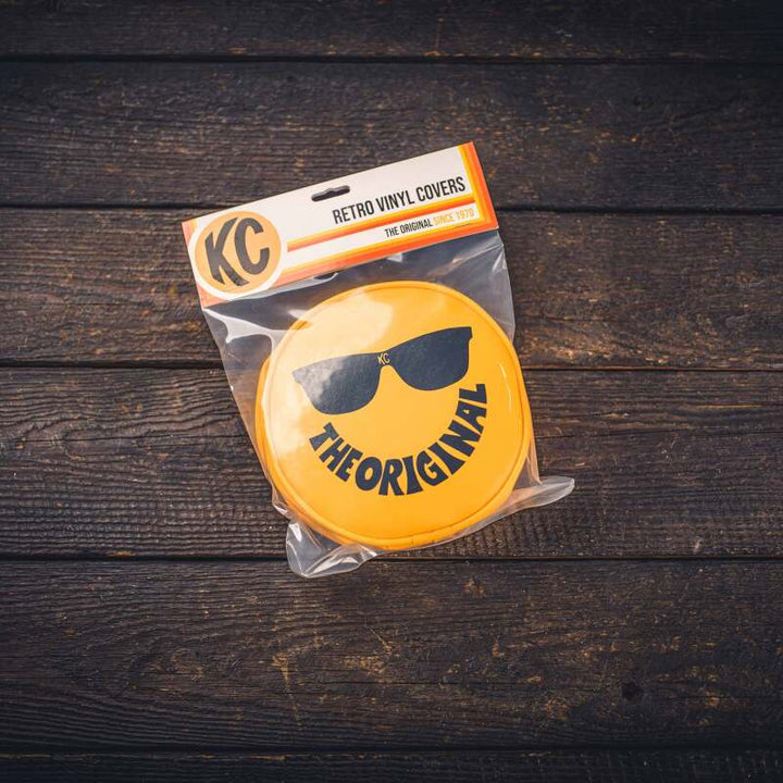 KC HiLiTES Retro 6in Round Yellow Vinyl Light Cover w/ Black KC Sunglasses Logo - Premium Light Covers and Guards from KC HiLiTES - Just 112.52 SR! Shop now at Motors