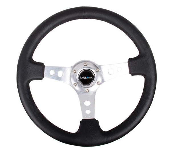 NRG Reinforced Steering Wheel (350mm / 3in. Deep) Blk Leather w/Silver Spoke & Circle Cutouts - Premium Steering Wheels from NRG - Just 503.28 SR! Shop now at Motors