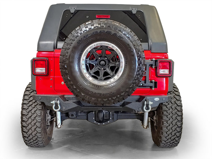 DV8 Offroad 2018+ Jeep Wrangler Tire Carrier - Premium Chase Racks from DV8 Offroad - Just 2321.86 SR! Shop now at Motors