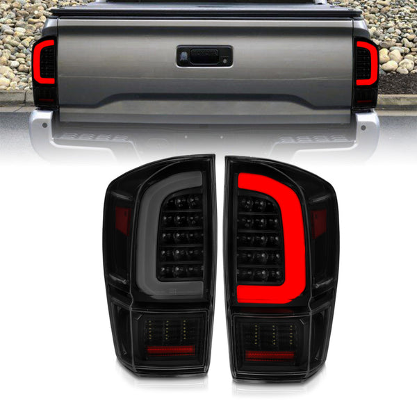 ANZO 16-21 Toyota Tacoma LED Tail Lights - w/ Light Bar Sequential Black Housing & Smoke Lens - Premium Tail Lights from ANZO - Just 1796.08 SR! Shop now at Motors