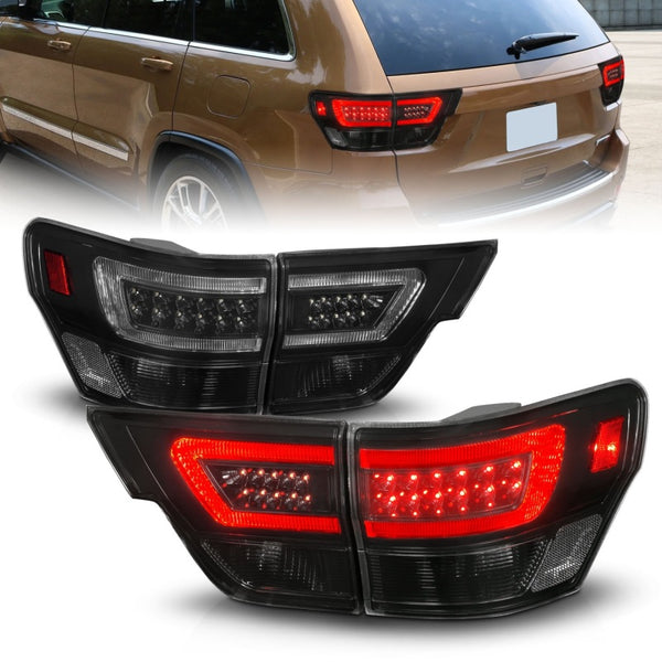 ANZO 11-13 Jeep Grand Cherokee LED Taillights w/ Lightbar Black Housing/Smoke Lens 4pcs - Premium Tail Lights from ANZO - Just 2533.69 SR! Shop now at Motors