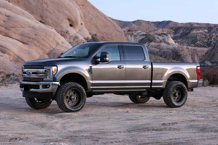 Fabtech 17-21 Ford F250/350 4WD Gas 4in Rad Arm Sys w/Coils & 2.25 Dl Resi Frt & Dl Rr Shks - Premium Lift Kits from Fabtech - Just 14347.54 SR! Shop now at Motors