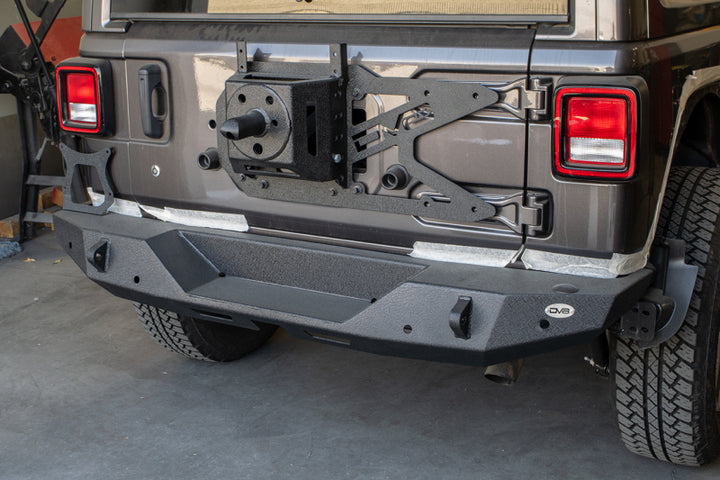 DV8 Offroad 2018+ Jeep Wrangler JL Tailgate Mounted Tire Carrier - Premium Chase Racks from DV8 Offroad - Just 1402.14 SR! Shop now at Motors