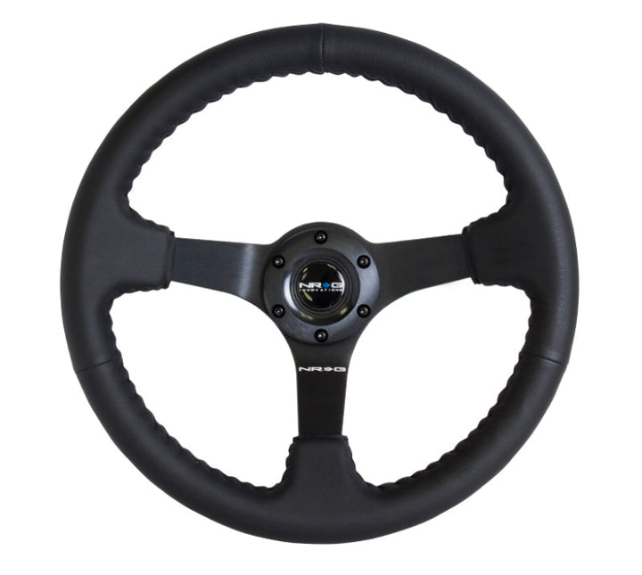 NRG Reinforced Steering Wheel (350mm / 3in. Deep) Bk Leather w/Bk BBall Stitch (Odi Bakchis Edition) - Premium Steering Wheels from NRG - Just 676.05 SR! Shop now at Motors